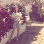 my sister, Terri, hunting eggs in what appears to be tennis shoes and a spring-ish ladies' nightie.